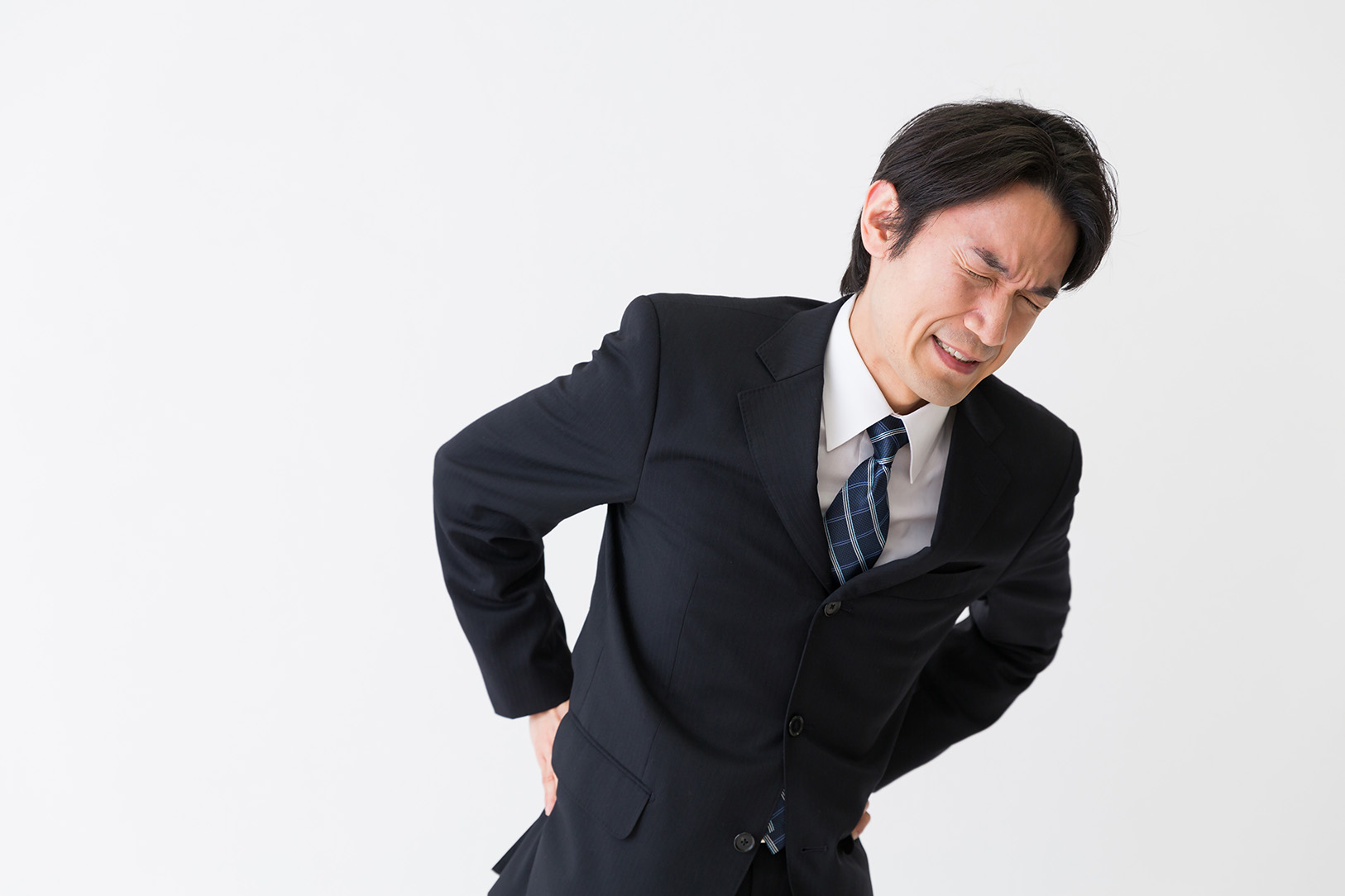 筋膜性腰痛（腰から背中への張り感と痛み）